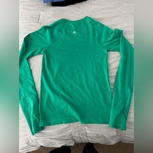 Bright green lululemon long sleeve swiftly tech in size 2